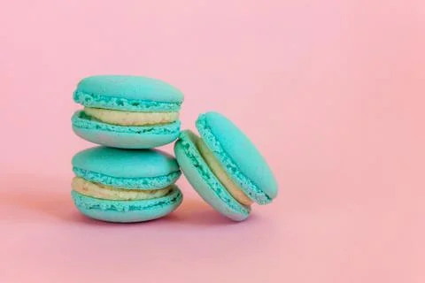 Blue macaron on pink background 스톡 사진