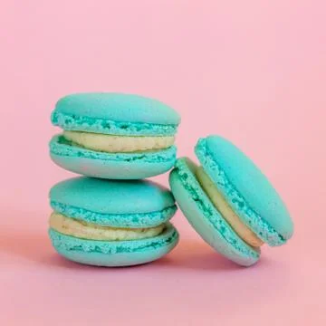 Blue macaron on pink background Stock Photos