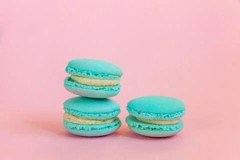 Blue macaron on pink background Stock Photos