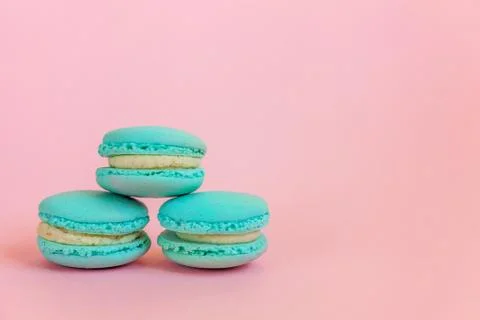 Blue macaron on pink background Stock Photos