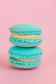 Blue macaron on pink background Stock Photos