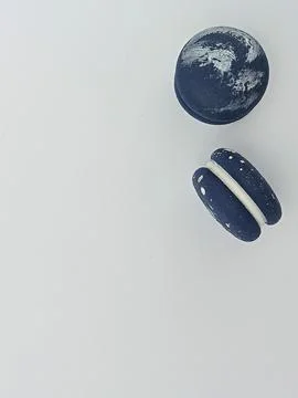 Blue macarons with copy space on white background Stock Photos