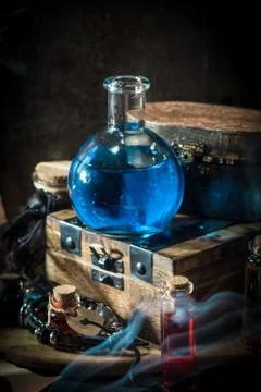 Blue magic potion with smoke Stock Photos
