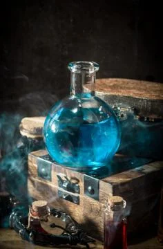 Blue magic potion with smoke Stock Photos