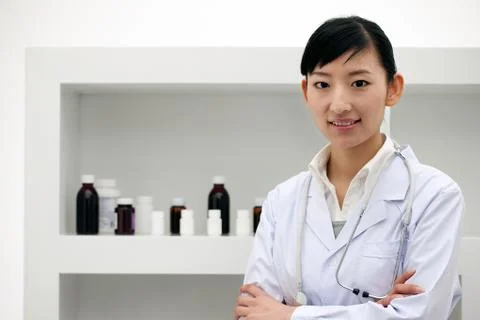 The Blue Man of the Year Face the camera. Medicine Adult woman White coat Drugs Stock Photos