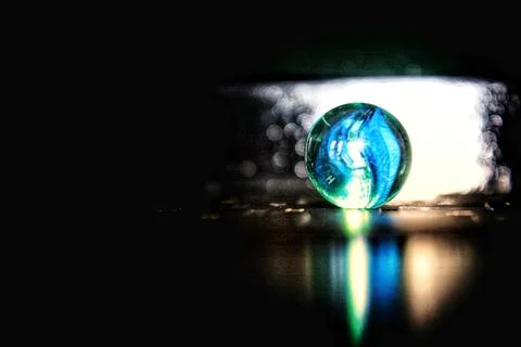 Blue marbles on a blue background Stock-Fotos