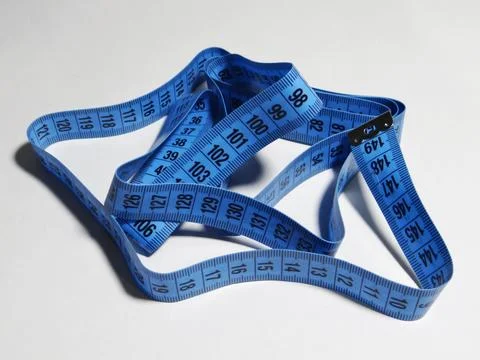 Blue measuring tape on white background Stock Photos