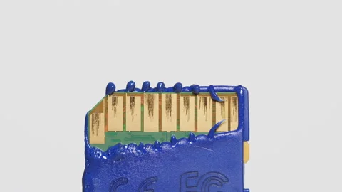 Blue memory card being melted. Video stock 148542515