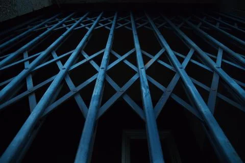 Blue metal security gate Stock Photos
