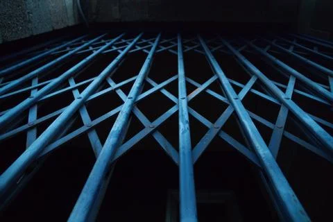 Blue metal security gate Stock Photos