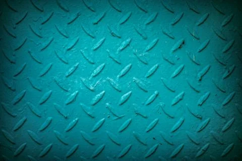 Blue metal texture with a pattern in the form of lines and petals, vignetting Stock Photos