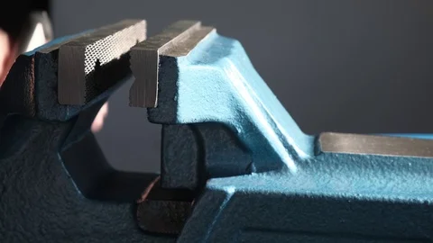 Blue metal vice, bench tools close-up. Video stock 124207154
