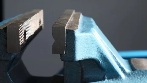 Blue metal vice, bench tools close-up in a workshop. Stock Footage 124207780