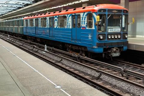 Blue metro train arriving at the underground station. Russia - 07 August 2026 Stock Photos