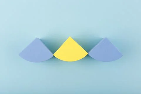 Blue minimal abstract composition with geometric shapes in a row against blue Stock Photos