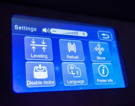 Blue modern touch screen of 3D printer. Close-up. Visible pixel detail. Stock Photos