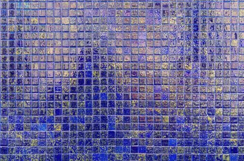 Blue mosaic tile surface showing textured small square pattern Stock Photos