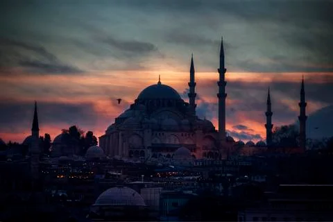 The blue mosque on the background of the red sky in a sunset scene, Istanbul  Stock Photos