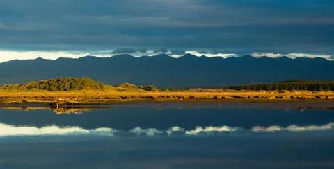 Blue mountain reflection Stock Photos