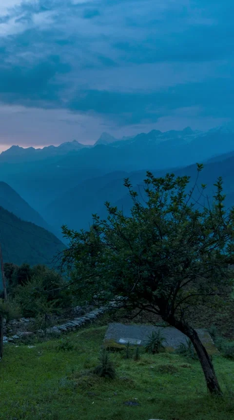 Blue mountain valley at duskBlue Himalayan sunrise timelapse over Gangotri .. Stock Footage 339878041