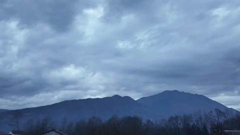 Blue mountains shrouded in clouds. Stock Footage 317679237