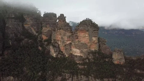 Blue Mountains three sisters in cloud aerial orbit 1 Stock Footage 124762682