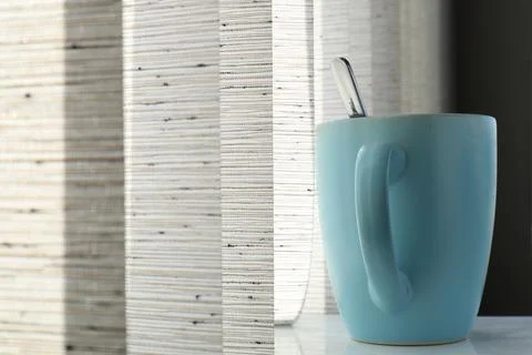 Blue mug with spoon Stock Photos