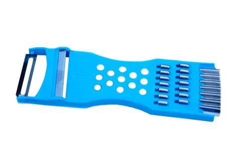 Blue multi purpose vegetable or cheese slicer, isolated on white background. Stock Photos