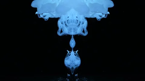 A blue mystical cloud of smoke explodes in the black space 库存影片 317592768
