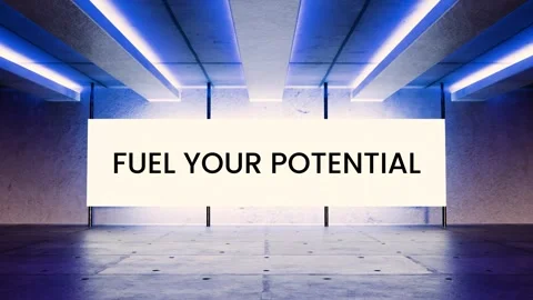 Blue neon screen in a high-tech room displays “Fuel Your Potential” Stock Footage 312544048