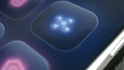 Blue network cluster icon illuminates on a smartphone control panel 库存照片