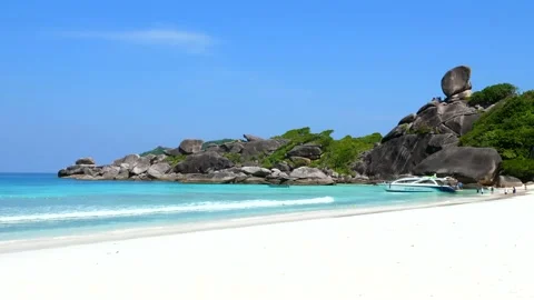 Blue Ocean Beach with Big Rocks, Turquoise Water and Greenery on Tropical Island Stock Footage 149131165