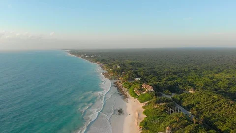 Blue ocean beach seen from above moving backward aerial shot Video stock 124133111