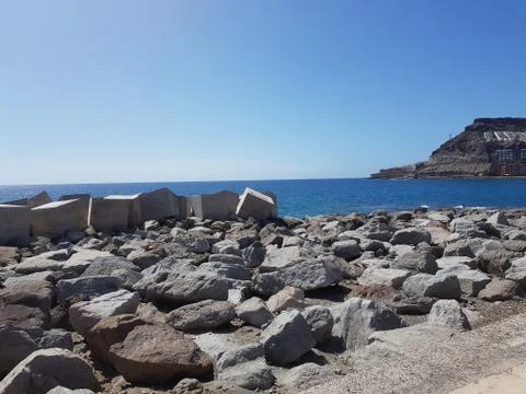 Blue ocean with massive stone casting on the canary islands Foto stock