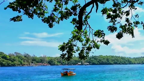Blue ocean scenery from a beachfront bungalow in Sabang, Aceh Stock Footage 321259964