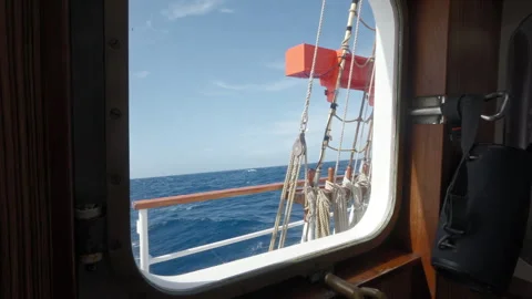 Blue Ocean Seen Through Sailing Ship Window Stock Footage 337790168