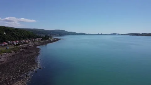 Blue ocean small town flying drone aerial 4k perfect day Stock Footage 185494294