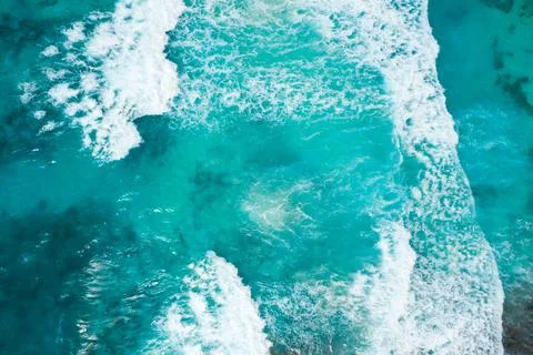 Blue ocean texture with waves and foam. La Digue Island, Seychelles Stock Photos