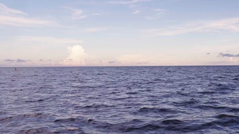 Blue Ocean Water with light Cloudscapes Stock Footage 95469726
