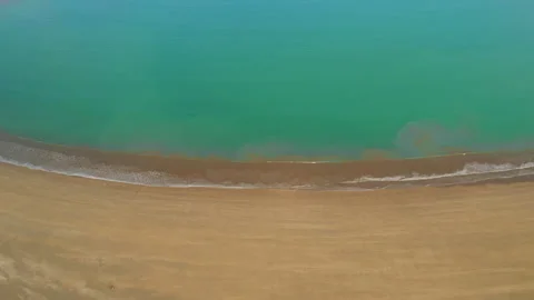 Blue ocean water meets sandy shore at Marino Ballena National Park Costa Rica Stock Footage 341357651
