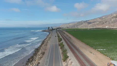 Blue ocean water with waves rolling into the beach at Rincon Beach Stock Footage 220154648