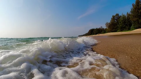 Blue ocean wave on sandy beach Video stock 236225174