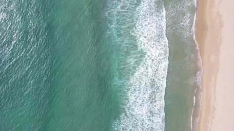 Blue ocean waves and beach aerial view, natural background. Stock Footage 317152396