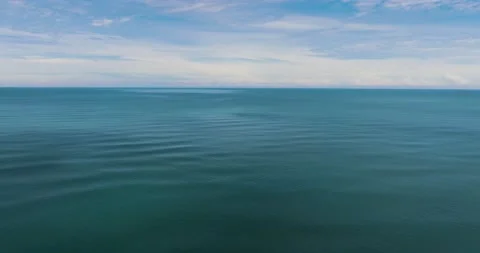 Blue ocean with waves and sky with clouds. Stock Footage 236635527