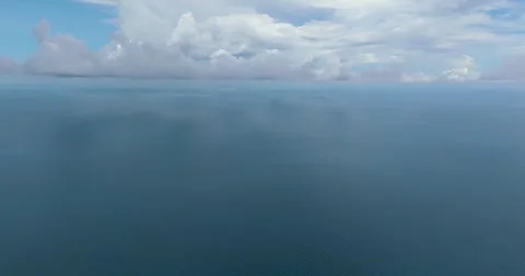 Blue ocean with waves and sky with clouds. Stock Footage 345390394