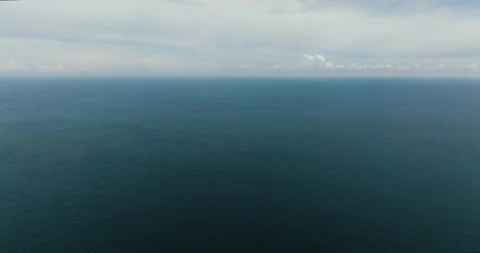 Blue ocean with waves and sky with clouds. Stock Footage 345391064