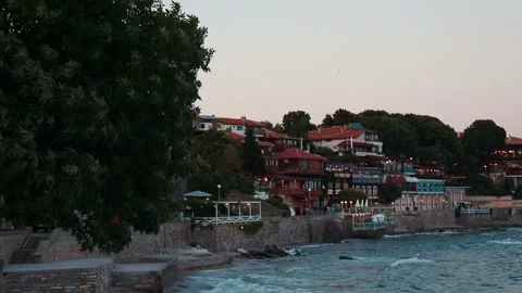 Blue ocean waves crush in slow motion in beautiful Bulgaria seaside restaurant Stockbeeldmateriaal 160998530