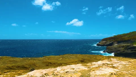 Blue ocean waves hit mountain rocks in slow motion. Lanai lookout in Hawaii. Stock Footage 204578190