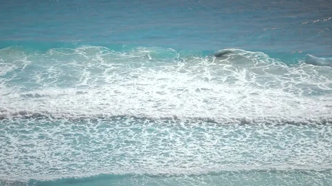 Blue Ocean Waves Reaching The Bay On A Sunny Day 스톡 동영상 153339175