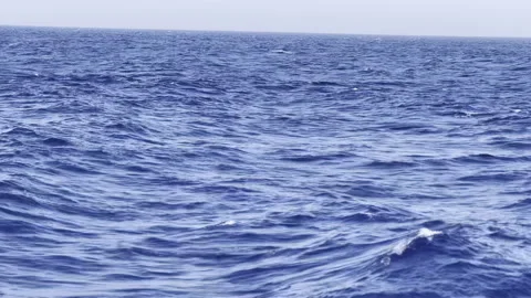 Blue ocean waves rolling from boat Stock Footage 287186343
